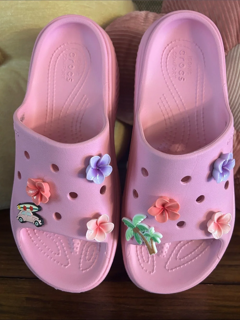 Crocs Pink stomp slides with charms